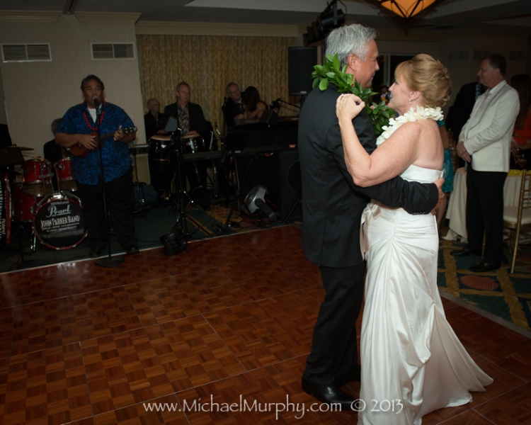 First dance as husband and wife with a ukulele player at a Riverside Hotel wedding in Ft. Lauderdale.