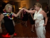 Bride dances with a guest at her reception in the Riverside Hotel, Ft. Lauderdale.