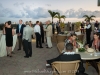 The sun sets while wedding guests enjoy cocktails on the patio of the Riverside Hotel in Ft. Lauderdale.
