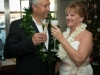 Bride and groom toast to their marriage at the Riverside Hotel, Ft. Lauderdale.