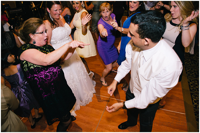 Bride and groom dance with their guests at a a Sheraton Station Square, Pittsburgh wedding.