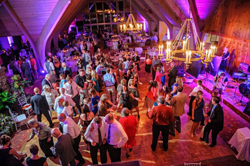 Peek n Peak Wedding Reception Dance Floor with Gorgeous Purple Lighting and Chandeliers
