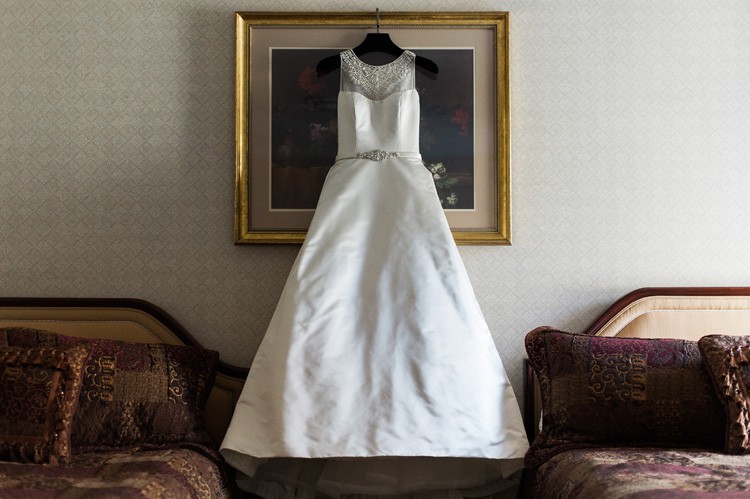 Omni Willian Penn Pittsburgh Wedding Dress Hanging From Hotel Picture Frame